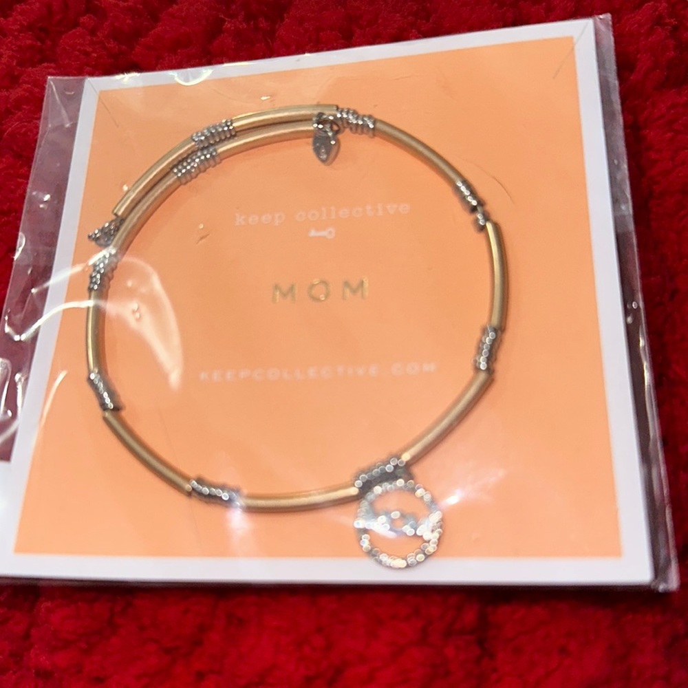 Stella & Dot Gold MOM bracelet.